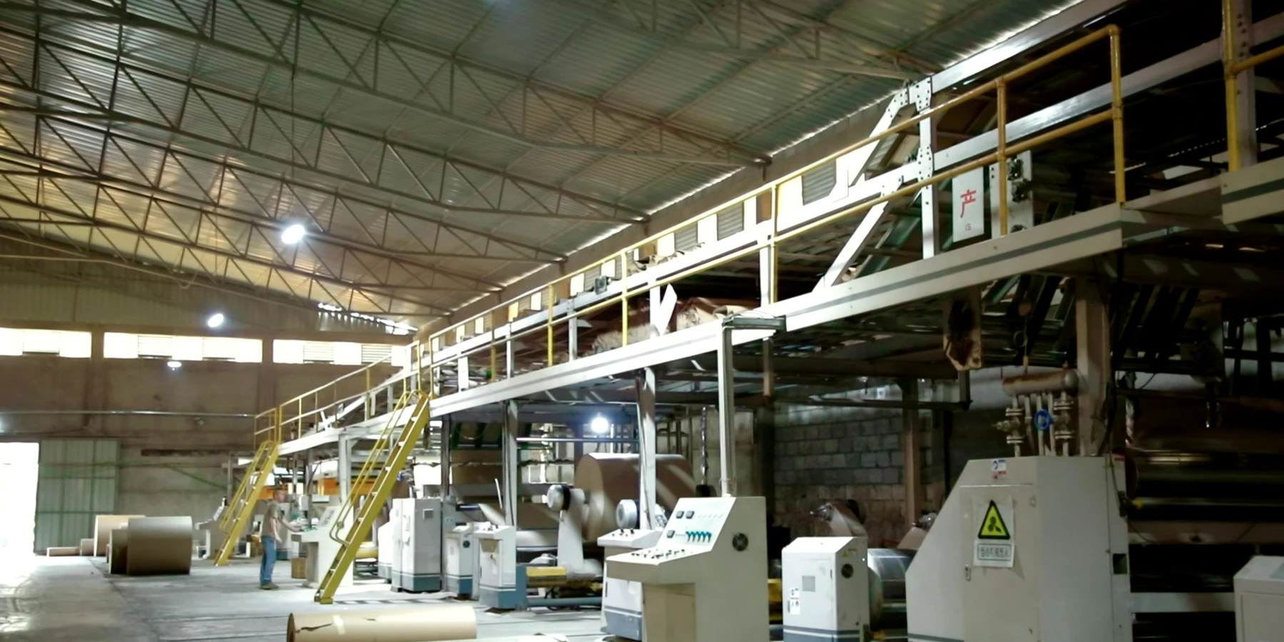 Wide view of the corrugating line running at full width.